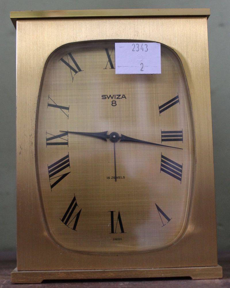 A Swiza 8 brass cased mantel clock