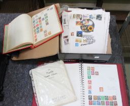 A box of stamp albums and loose stamps various