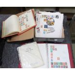 A box of stamp albums and loose stamps various