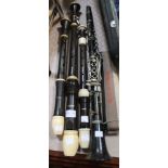 A clarinet together three recorders