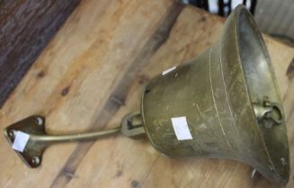 A cast brass wall hanging pub bell