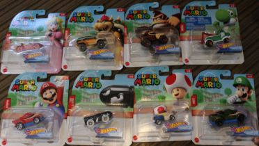A set of eight Hot Wheels Super Mario character cars, in blister packs (8)
