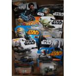 A collection of Hot Wheels Star Wars vehicles in original blister packs (12)