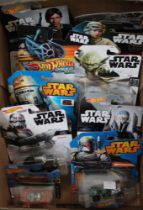 A collection of Hot Wheels Star Wars vehicles in original blister packs (12)