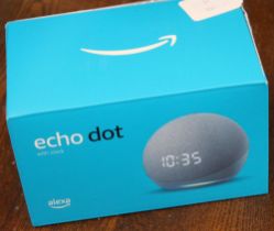 An Alexa echo dot, in original box