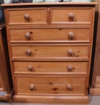 A pine chest of two short over four long drawers 88 x 110 cm