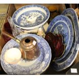 A box containing a selection of blue and white china plates, glassware, etc.