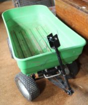 The Handy green plastic metal based four wheel garden trolley / trailer