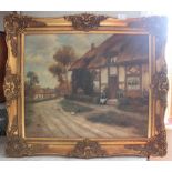 A modern canvas of a cottage scene in gilt frame