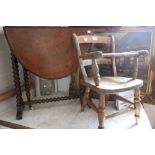 A 19th century oval walnut veneer drop leaf Sutherland table, raised on bobbin turned frame, togethe