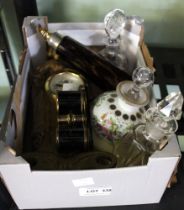 An Art Nouveau mantle clock, pair of Opera Glasses and various scent bottles