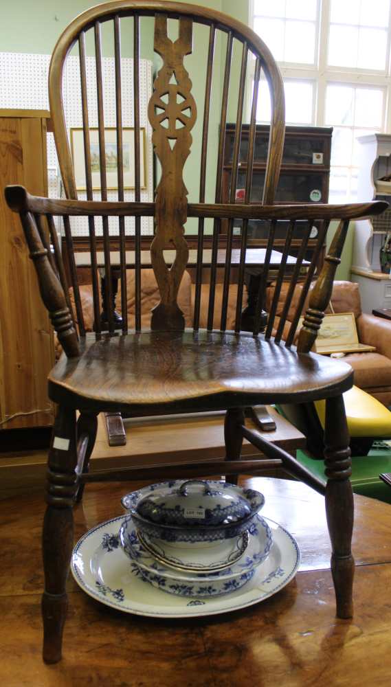 A 19th century Windsor double comb-back ash & elm chair with wheelback splat