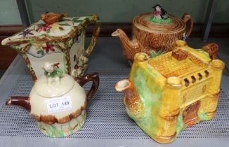 A small pottery teapot in the form of a toadstool, the lid having a seated pixie knop, together with