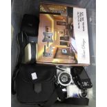 A Nikon Coolpix L810 digital camera in case, together with other cameras & TV wall-bracket