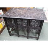 A decoratively carved Anglo / Indian oblong folding campaign table