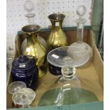 A box containing a pair of brass vases, two decanters and various other glass and china wares