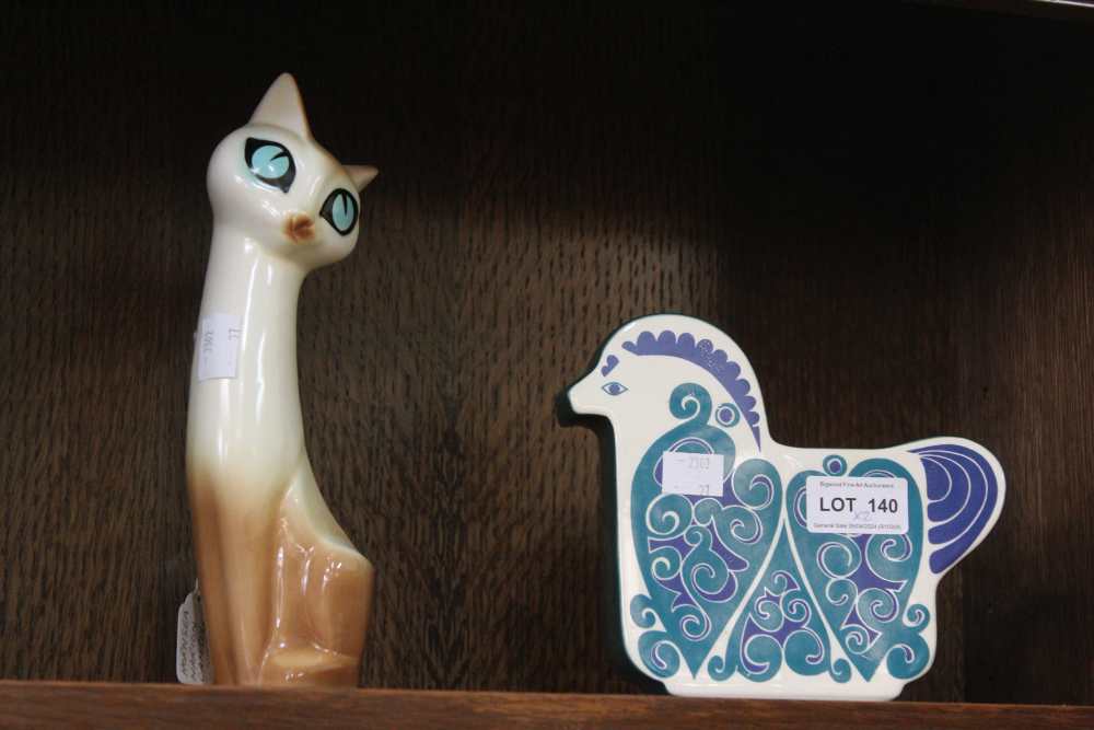 A Hornsea ceramic Siamese cat with a Carlton Ware ceramic bird money box