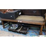 A 19th century mahogany low bench with gothic style front legs on rear block legs and rear stretcher