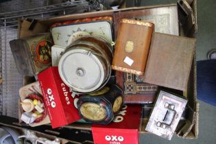 A box of assorted tins etc