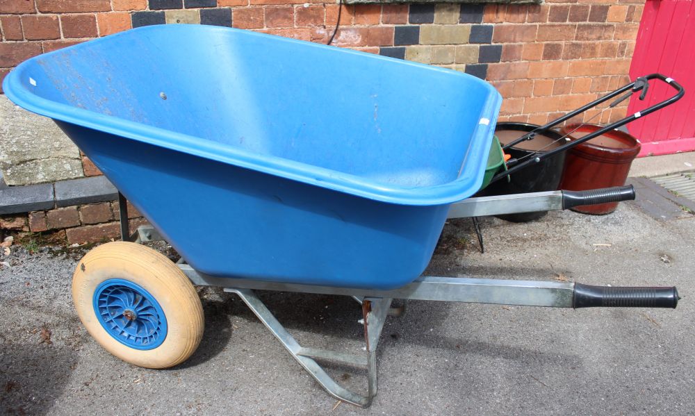 A very large aluminium framed & plastic twin wheeled wheelbarrow