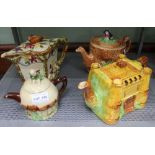 A small pottery teapot in the form of a toadstool, the lid having a seated pixie knop, together with