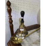 A hand bell with an ebonised handle, a brass ladle and a warming pan with turned wood handle (3)