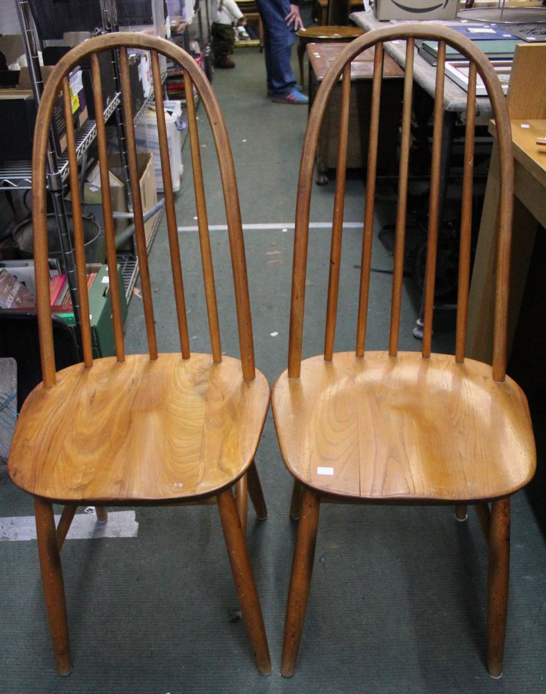 A pair of Ercol style hoop back kitchen chairs