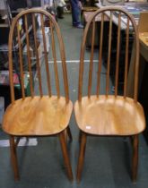 A pair of Ercol style hoop back kitchen chairs