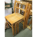 Three vintage stacking wooden school chairs