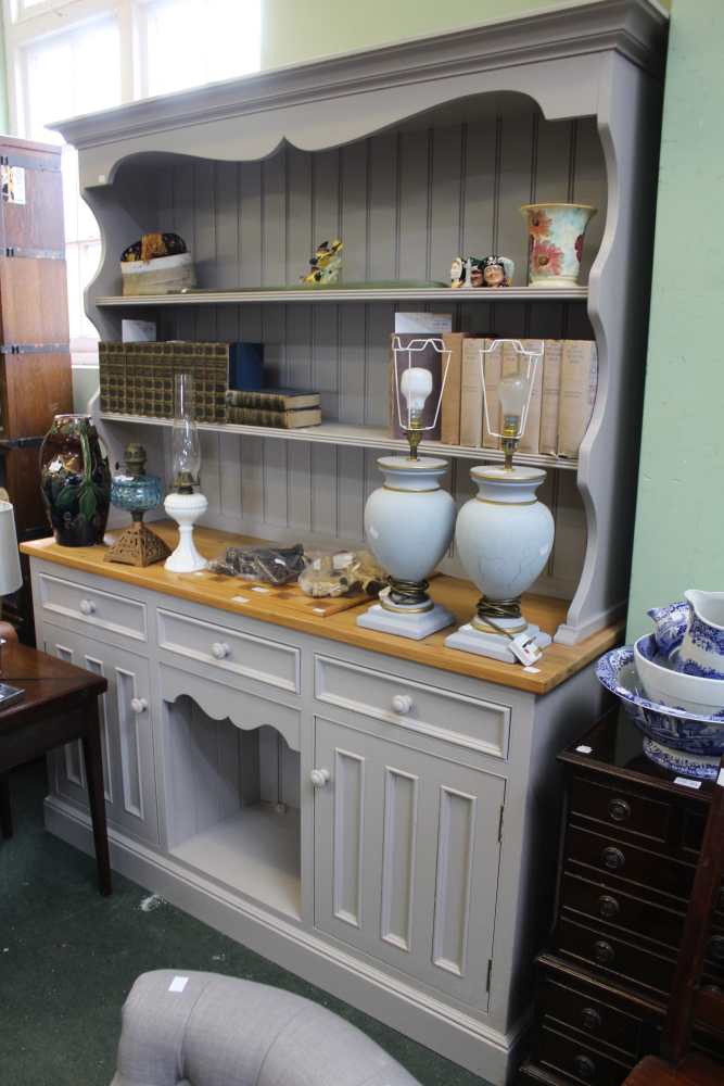 A modern pine and grey painted kitchen dresser with three inline drawers over do kennel and twin