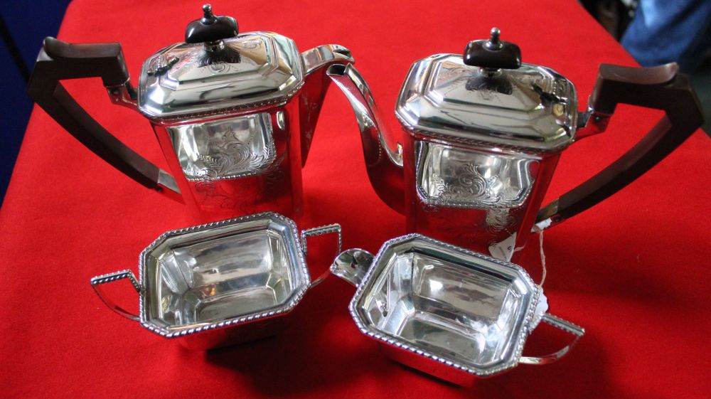 Goldsmiths and Silversmiths Company, a silver plate on copper four piece coffee set, comprising coff