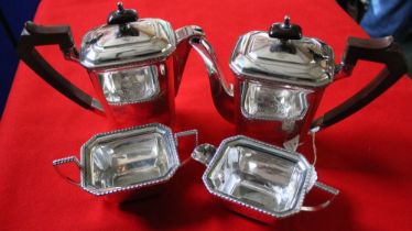 Goldsmiths and Silversmiths Company, a silver plate on copper four piece coffee set, comprising coff