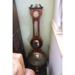 A Somalvico 19th century mahogany cased wheel barometer with thermometer and hydrometer