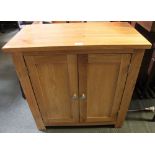 A modern oak two drawer cupboard