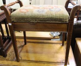 An Edwardian inlaid mahogany piano stool with lift up tapestry upholstered lid