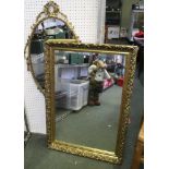 An oval metal gilt wall mirror, and a rectangular gilt framed wall mirror
