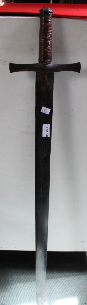 A Templar style sword, with leather wrapped handle, over all length 109cm
