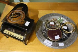 A vintage miniature wooden piano musical jewellery box