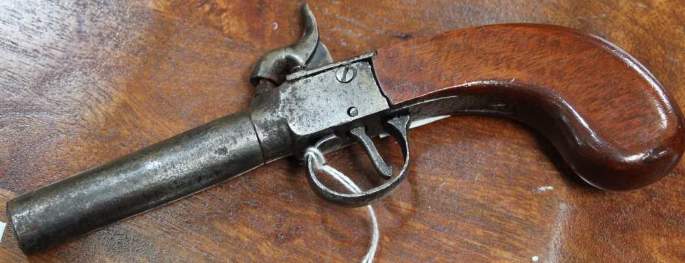 An early 19th century percussion cap pocket pistol