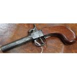 An early 19th century percussion cap pocket pistol