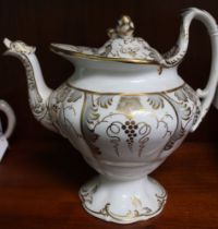 A 19th century china teapot, gilt and grey decoration