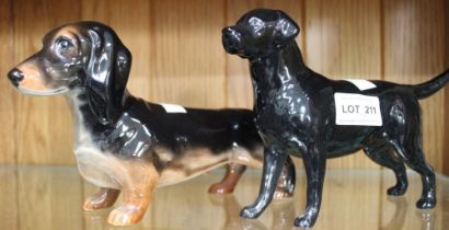 A Beswick dachshund together with a ceramic labrador