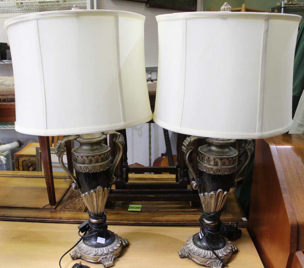 A pair of modern table lamps in the form of urns