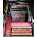 A tray containing vintage and modern hard back books including "Britain in Pictures" series