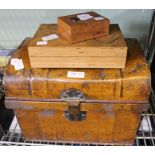A small tin trunk with two wooden boxes