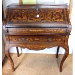 A 19th century Dutch design marquetry inlaid fall front bureau with fitted interior over drawer to b
