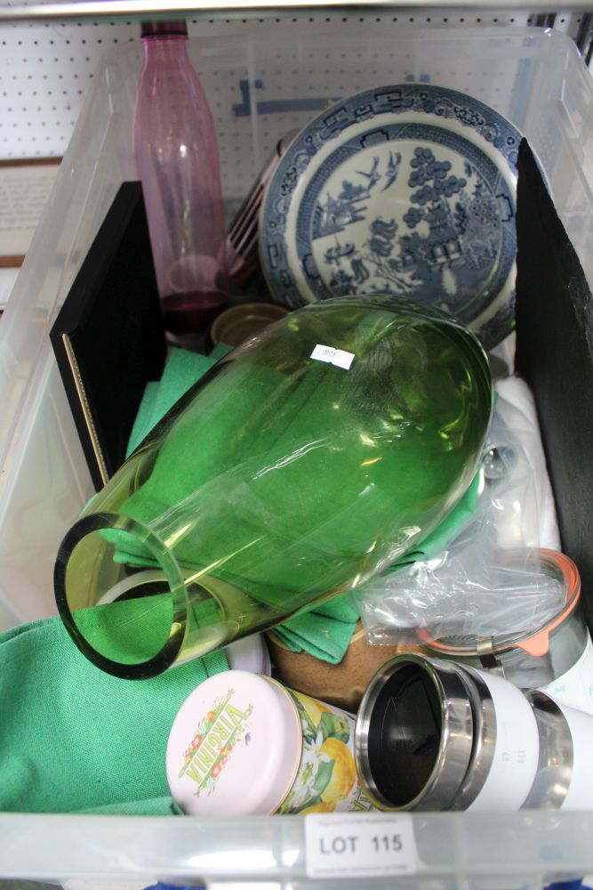 A box containing a large selection of modern household wares