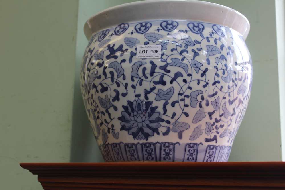 A blue and white ceramic planter