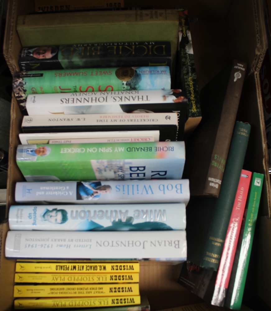 A box of cricket related books