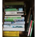 A box of cricket related books